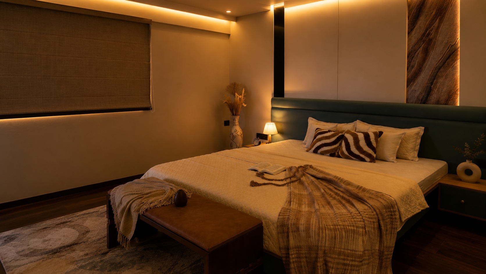 Master bedroom suite with leather bench and backlit headboard